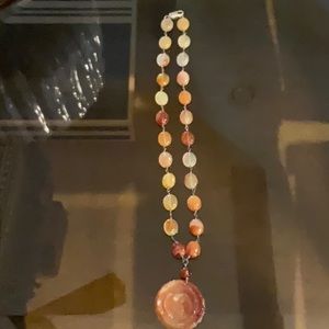 Beautiful cream, orange & amber colored glass / stone necklace.  Lovely!
